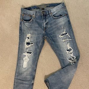 American Eagle Core Flex faded distressed denim jeans.  Size 32x30 and 31x30